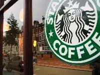 Insegna Starbucks Coffee