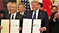 The US President Trump and the Chinese Vice Premier Liu He show the signatures that ratify the agreement of Phase 1 between the two super economic powers, regarding duties