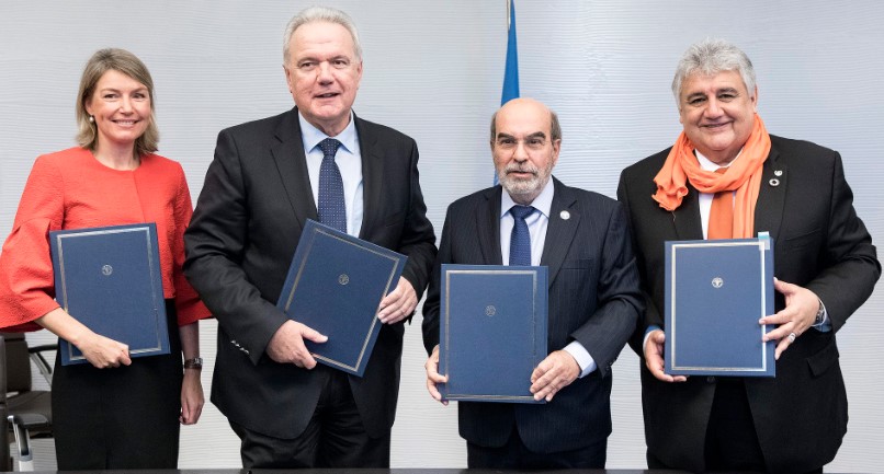 Left to right: Charlotte Salford, Associate VP, External Relations and Governance Department, IFAD; Neven Mimica, EU Commissioner International Cooperation and Development; José Graziano da Silva FAO DG; and, Amir M. Abdulla, WFP Deputy Executive Director at signing ceremony